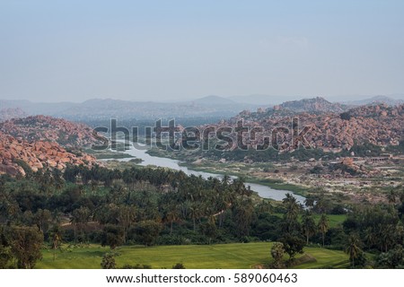 Hampi village seen from Anjaneya hills. Thungabhadra river seen in the picture.