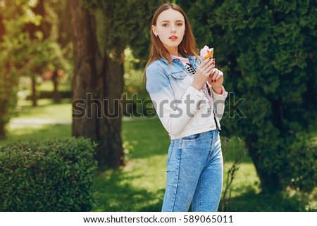beautiful model pose for a photo in trendy clothes