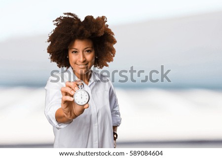 young black woman holding a stopwatch