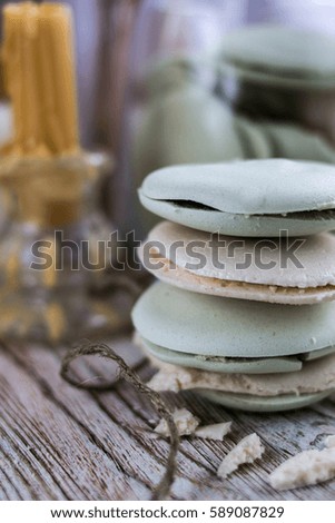 Sweets, candles on the wood background