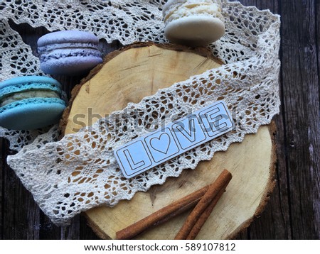 Love. Rustic love. Concept love background on wooden background with lace. 