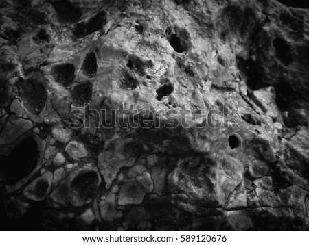 Natural black rock stone surface granite abstract backdrop textured background