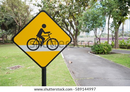 be aware bicycle sign