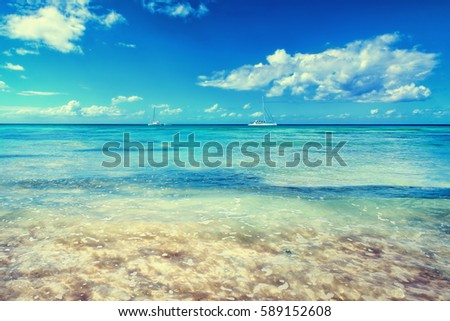Caribbean sea. Tropical, exotic water landscape with yachts on horizon. Topical paradise.  Ocean nature. Saona Island. Domincan Republic