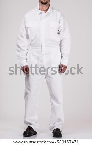 man in uniform worker Royalty-Free Stock Photo #589157471