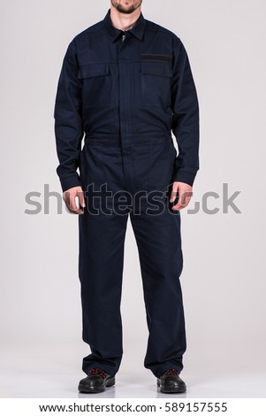 man in uniform worker Royalty-Free Stock Photo #589157555