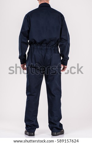 man in uniform worker Royalty-Free Stock Photo #589157624