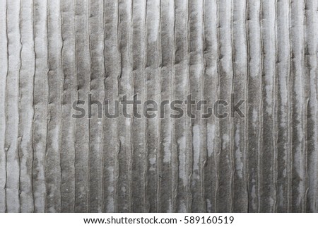 Old sheet of corrugated gray cardboard, texture background