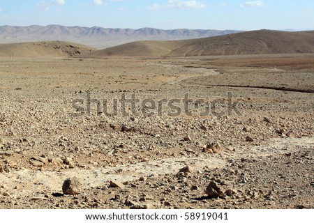 Stone desert near monastery Mar Musa in Syria Royalty-Free Stock Photo #58919041