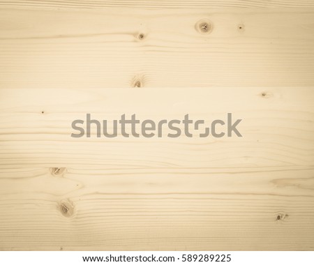 Pine wood texture woodgrain background in old aged yellow sepia brown color