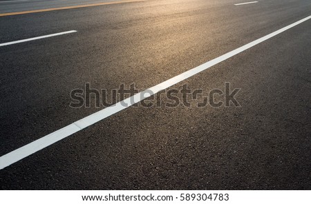 Road markings on asphalt