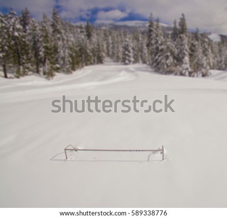 8' tall soccer goal covered by 7' of snow, this is what a field of 7' feet of snow looks like.