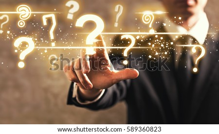 Question Marks with businessman on dark vintage background Royalty-Free Stock Photo #589360823