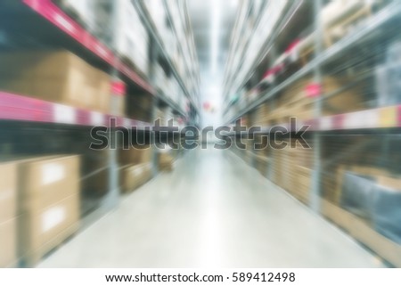 Blur background large indoor warehouse with high racks and products store on it for supply chain procurement operation logistic process e-commerce distribution omi channel b2b, b2c value chain concept Royalty-Free Stock Photo #589412498