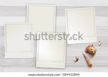 Part of set. Snapshots templates arranged on rustic wooden background with seashells around with copy space, top view