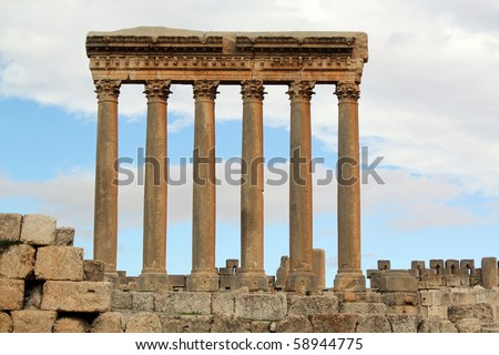 Sky with clouds and columns in roman temple Baalbeck, Lebanon Royalty-Free Stock Photo #58944775