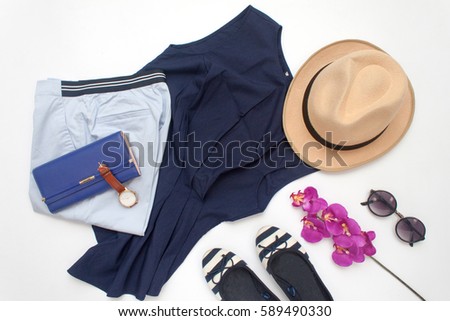 Women Trendy Outfits Flat Lay Photo with Purple Flower on White Background