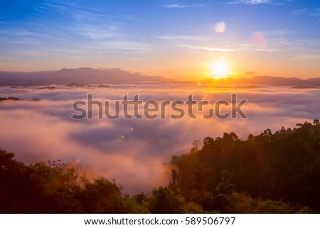 Beautiful sunrise in the morning over foggy tropical forest, on Viewpoint Phang Nga, Thailand, Long exposure photography.