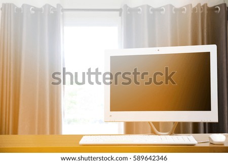 Workspace Desktop PC. for business ,background blur of curtain window morning light.copy space.