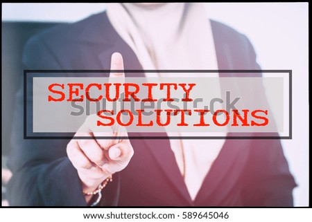Hand and text SECURITY SOLUTIONS with vintage background. Technology concept.