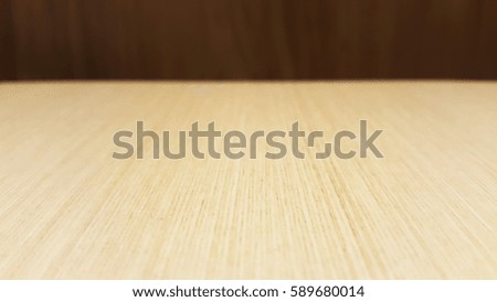 empty light cream wooden table for restaurant, web page, picture frame advertising chart board with brown dark background