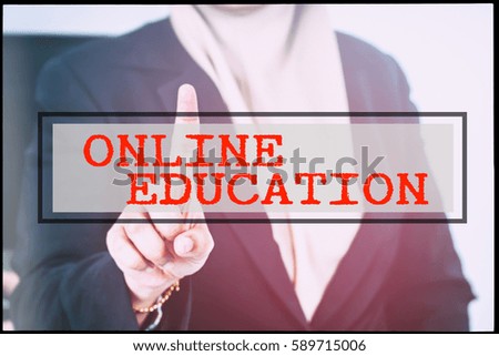 Hand and text ONLINE EDUCATION with vintage background. Technology concept.
