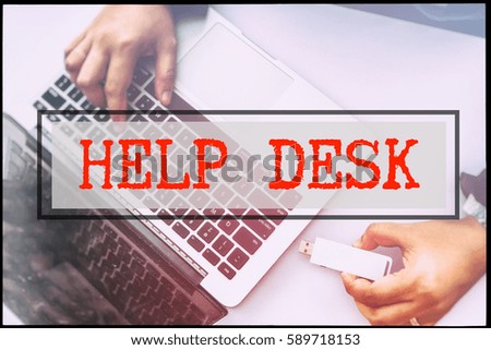 Hand and text HELP DESK with vintage background. Technology concept.