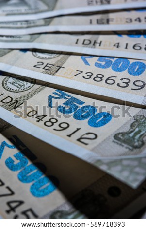 Extreme Closeup of New Indian Paper Currency Notes in abstract form or pattern. selective focus