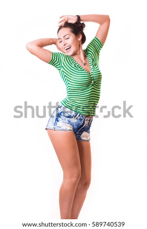 Happy young positive woman standing isolated on white background. Summer clothes
