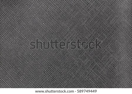 Black leather texture background. The abstract backdrop concept.