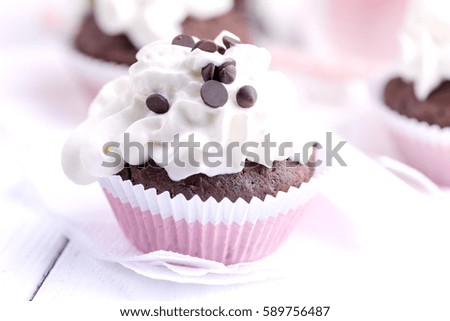 Tasty Chocolate cupcakes with chocolate drops Close up  Horizontal photo