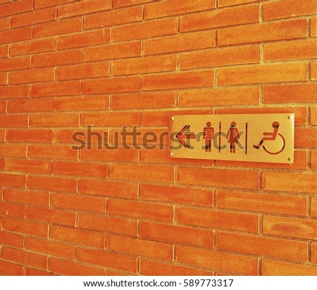 Signs to restroom. 