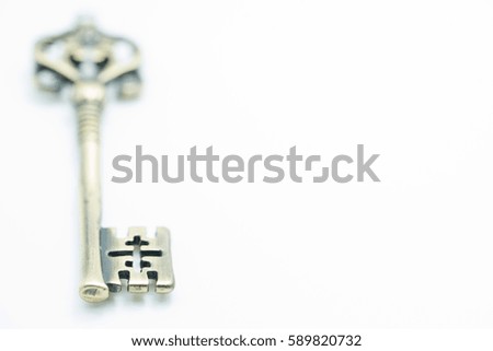 antique golden and silver door key isolated on white background