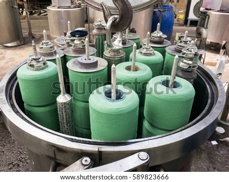 Machines for dyeing industry.Textile Industry, Dyeing Machine Chemical Tanks Royalty-Free Stock Photo #589823666
