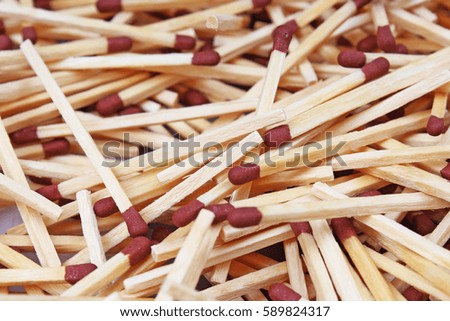 Match sticks with brown heads in a row. Fire Matches texture pattern concept. Stacked matches as background