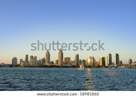 San Diego Skyline with a Sailboat at Sunset