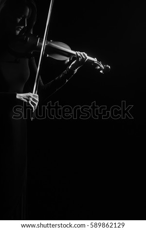 Violin player Violinist playing music instrument Classical musician symphony orchestra player isolated on black