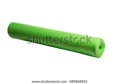 green yoga mat on a white background ,isolated