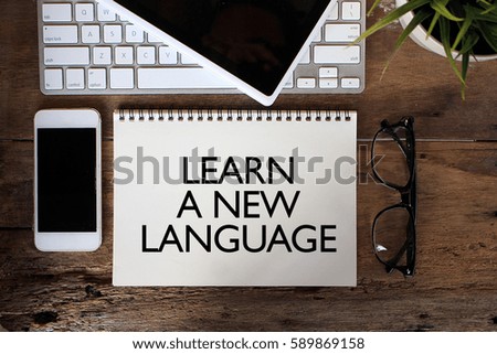 LEARN A NEW LANGUAGE sketch on notebook
