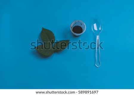  Blue background a spoon Leaves