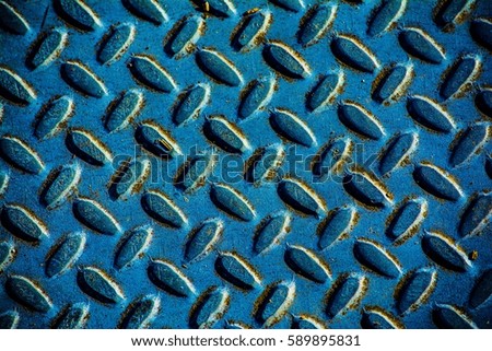 Oval Pattern: An oval pattern on a steel blue surface. Royalty-Free Stock Photo #589895831