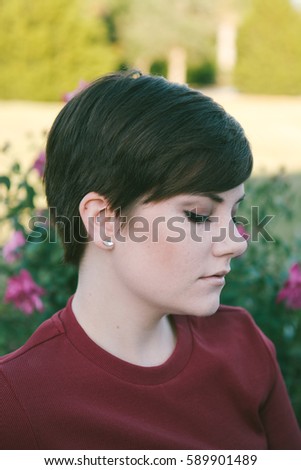 Young Woman Posing in the Park
