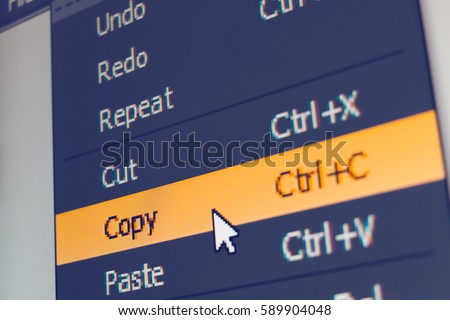 Software menu item with copy command highlighted and mouse cursor selected it, macro shot Royalty-Free Stock Photo #589904048