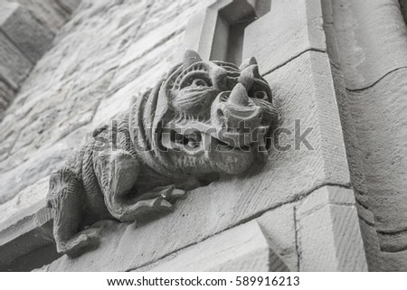 dragon sculpture on a wall