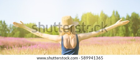 girl in a field and rejoices at the sun banner