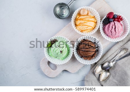 Selection of colorful ice cream scoops, copy space Royalty-Free Stock Photo #589974401