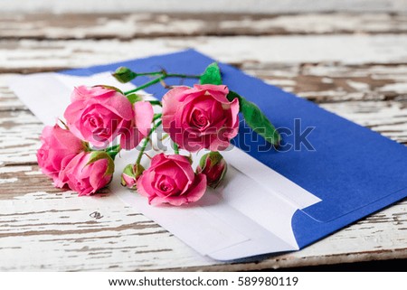 pink roses in the envelope