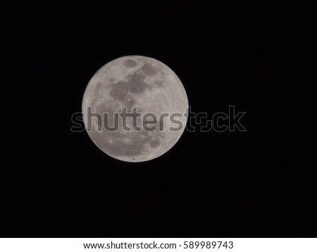 Full moon isolated on black