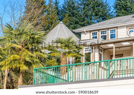 Top of a very neat and colorful home with gorgeous outdoor landscape in suburbs of Vancouver, Canada