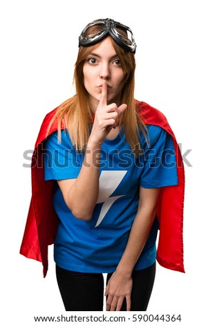 Pretty superhero girl making silence gesture